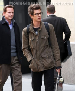 Andrew Garfield as Peter Parker in The Amazing Spider-Man wearing Oliver Peoples Glasses and carrying his skateboard