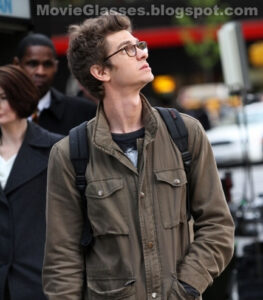 Andrew Garfield as Peter Parker walking through New York in The Amazing Spider-Man wearing Oliver Peoples Glasses