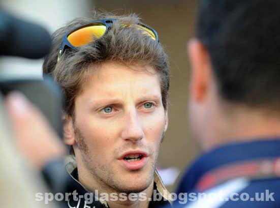 Romain Grosjean wearing Oakley Dispatch II Sunglasses over head- 2012