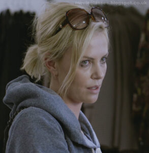 Charlize Theron in Young Adult wearing Dior Sunglasses while shopping for new clothes