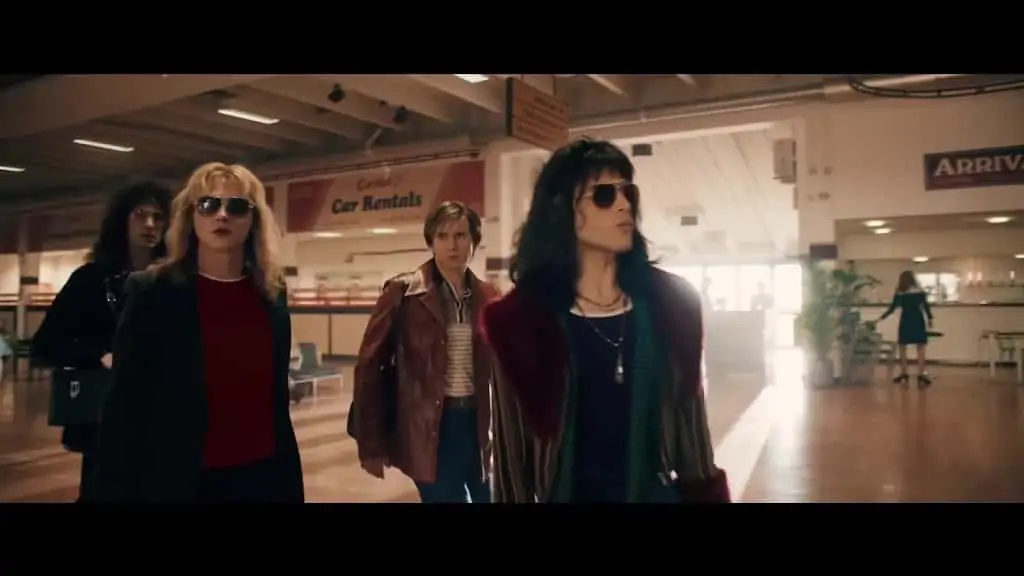 Rami Malek as Freddie Mercury and Queen Band Members in Bohemian Rhapsody wearing Sunglasses